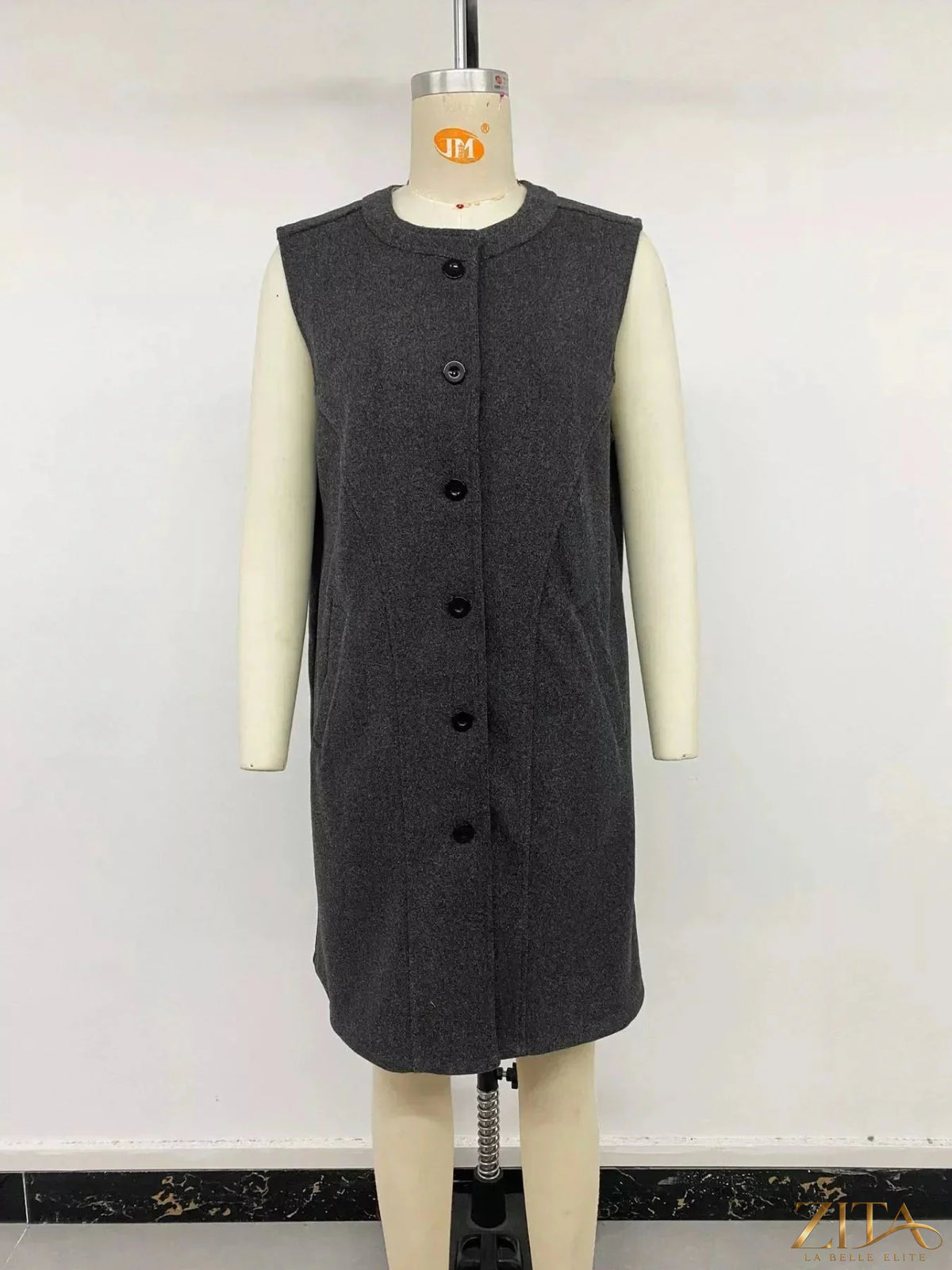 Zita La Belle Elite sleeveless Longine vest coat in stylish fabric, displayed on a mannequin with a neutral background.