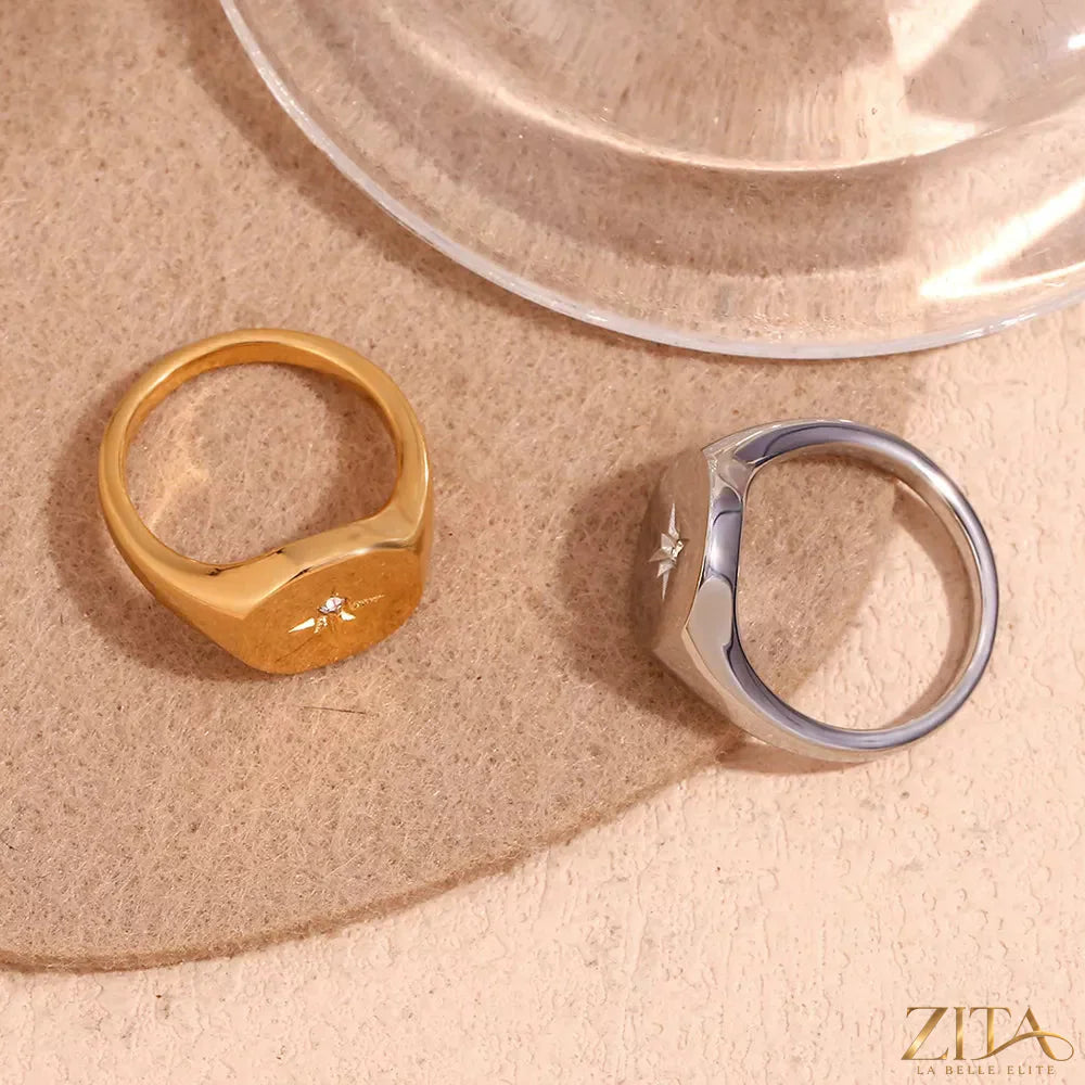 Gold minimalist North Star signet ring by Zita La Belle Elite, featuring a sleek, simple celestial design on polished metal.