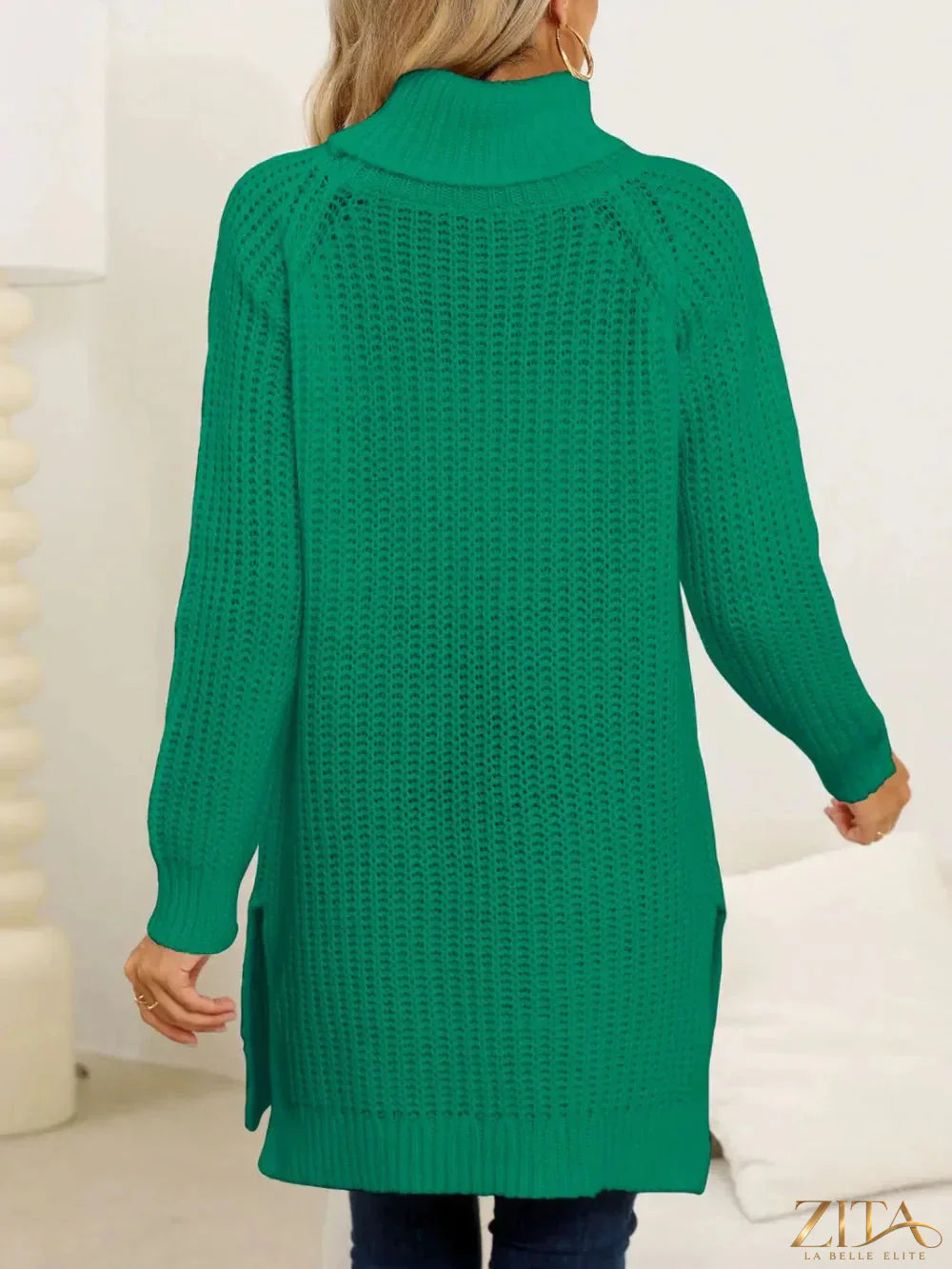 Trendsi slit turtleneck long sleeve sweater in soft knit fabric, featuring a stylish side slit and fitted silhouette.