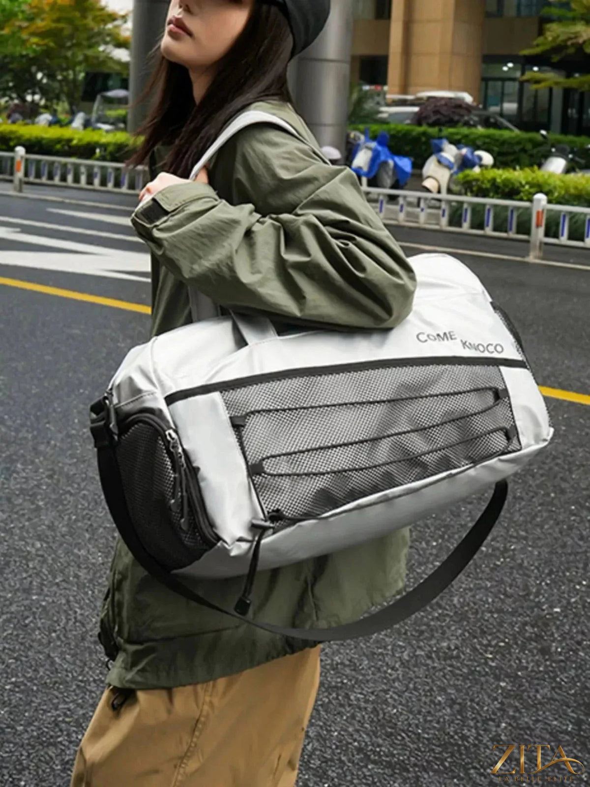 Zita La Belle Elite lightweight duffel bag with mesh pockets, black fabric, and sturdy handles for travel or gym use.