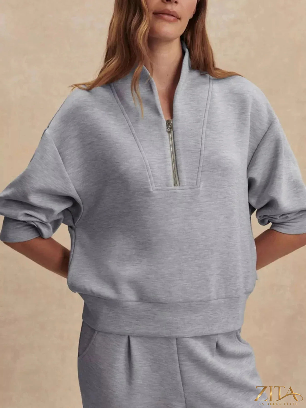 Zita La Belle Elite quarter-zip sweatshirt and wide-leg pants set, in soft fabric, styled for casual comfort and modern fashion.