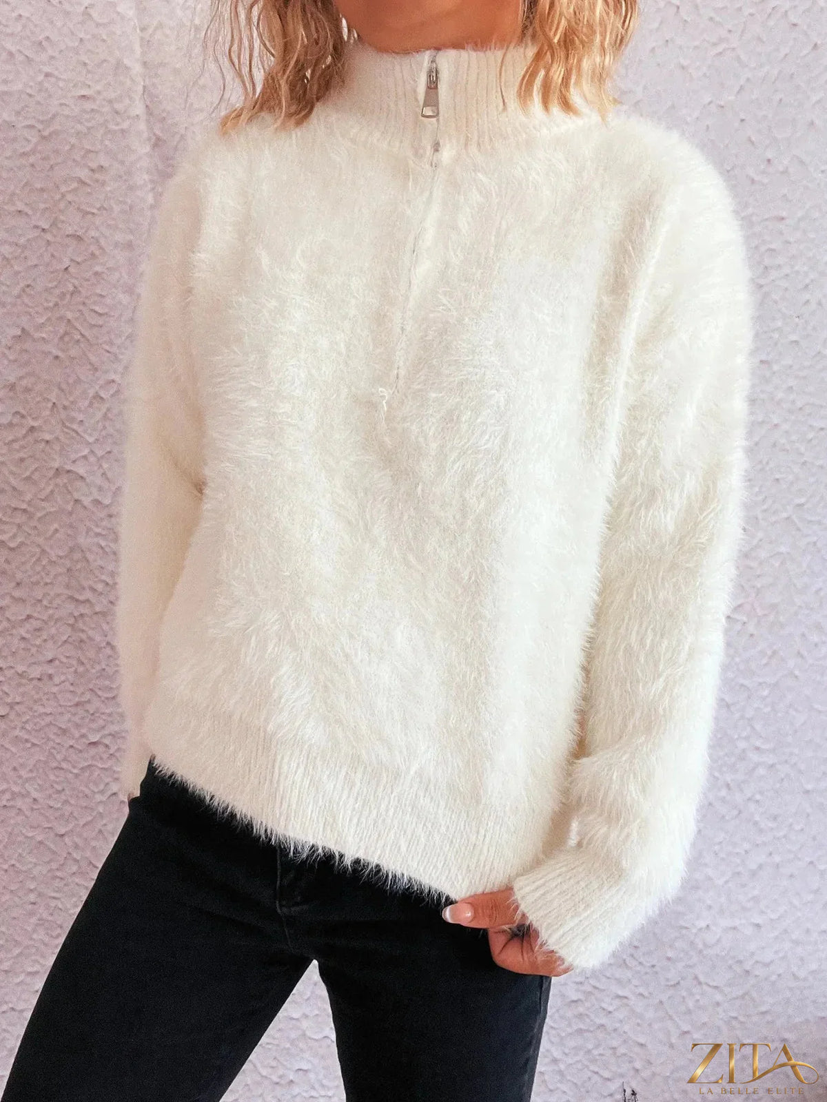 Zita La Belle Elite cozy fuzzy half-zip sweater in soft material, shown in a close-up of the warm, textured fabric.