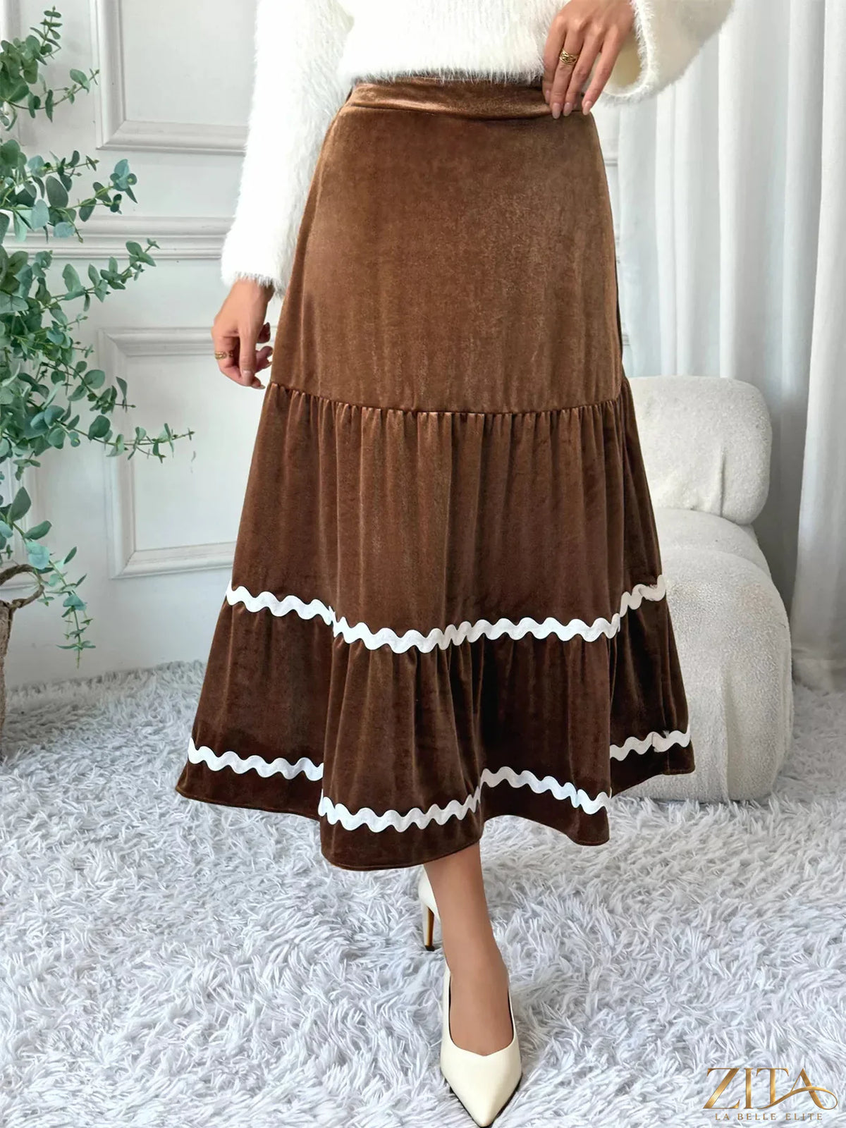 Velvet tiered midi skirt by Zita La Belle Elite featuring a flowing design and tiered layers in rich velvet fabric.