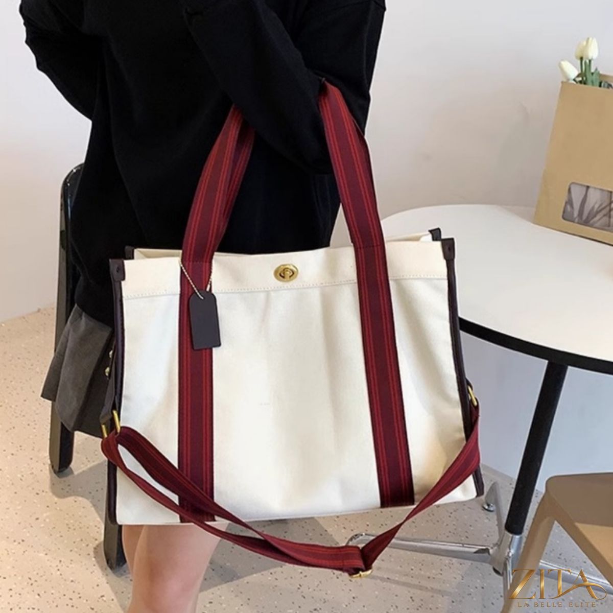 Zita La Belle Elite contrast canvas tote bag with black and white design, featuring sturdy handles and spacious interior.
