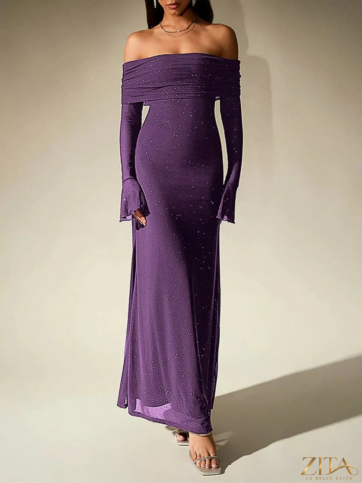 Zita La Belle Elite glitter off-shoulder maxi dress with flowing fabric and sparkling details, stylish evening wear for formal occasions.