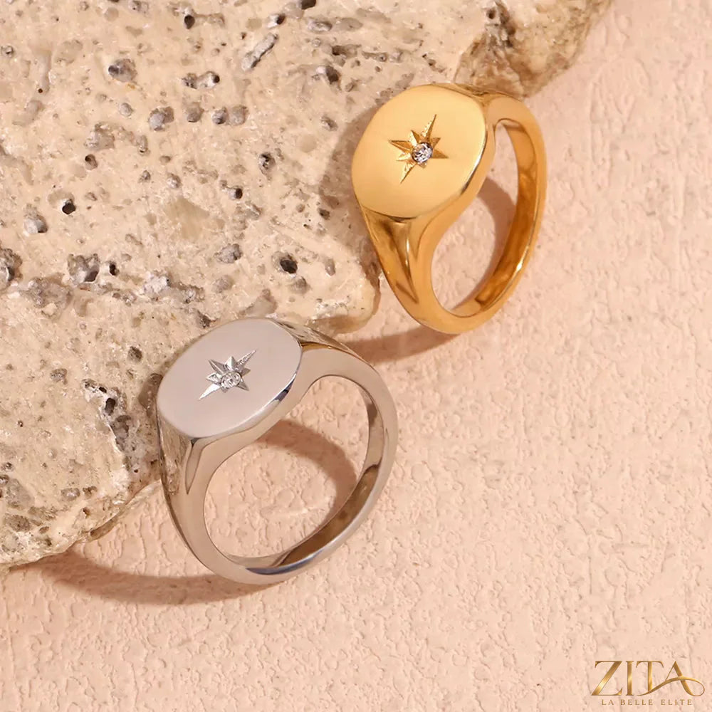 Minimalist North Star signet ring by Zita La Belle Elite featuring a sleek silver band and engraved star design.