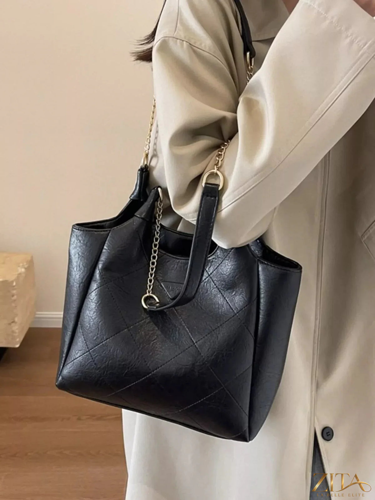 Trendsi PU leather shoulder bag with adjustable strap and sleek design, perfect for casual or formal outings.