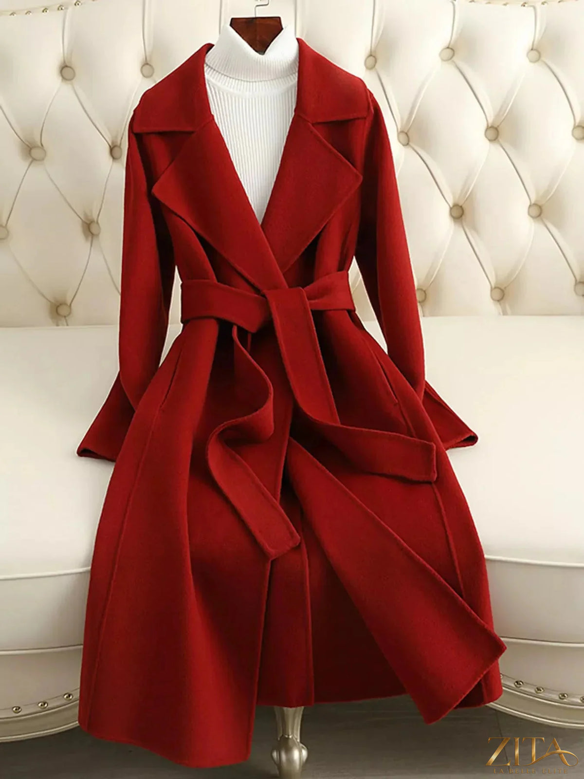 Zita La Belle Elite longline wool coat with waist-defining belt, featuring a classic tailored design and warm, textured fabric.