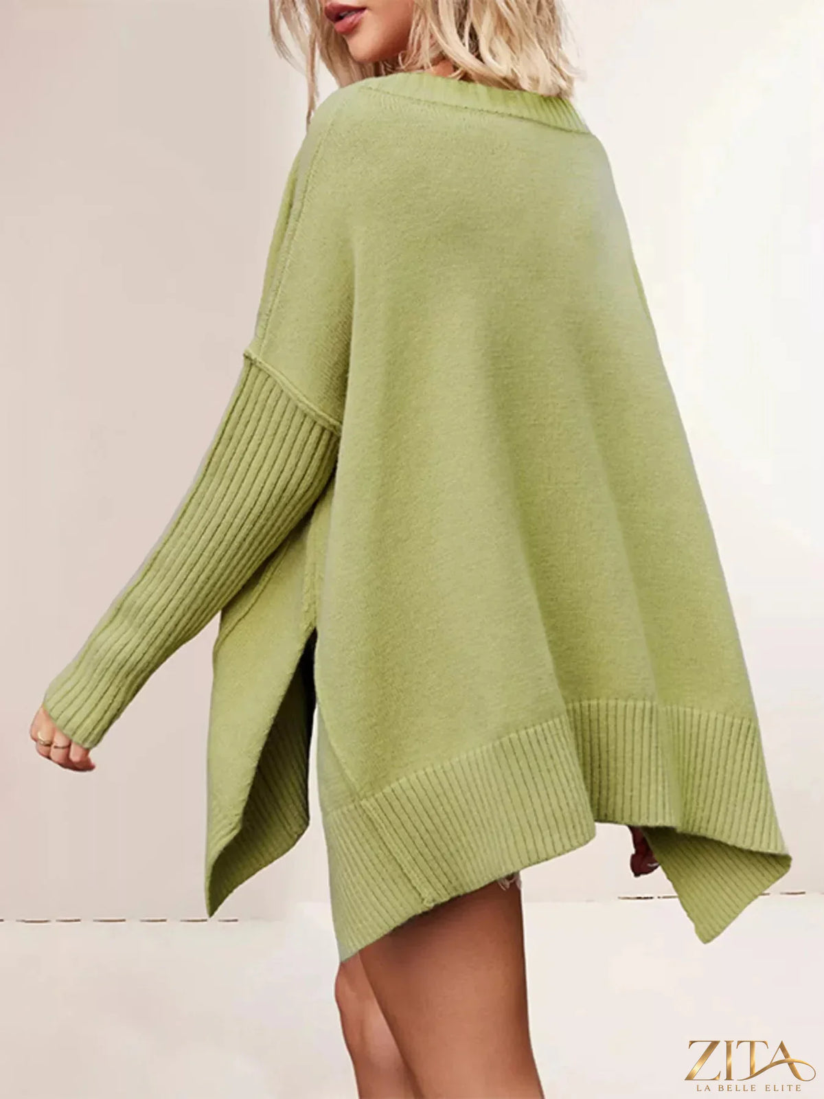 Zita La Belle Elite V-neck ribbed sleeve sweater in soft knit, featuring a classic V-neck and long ribbed sleeves.