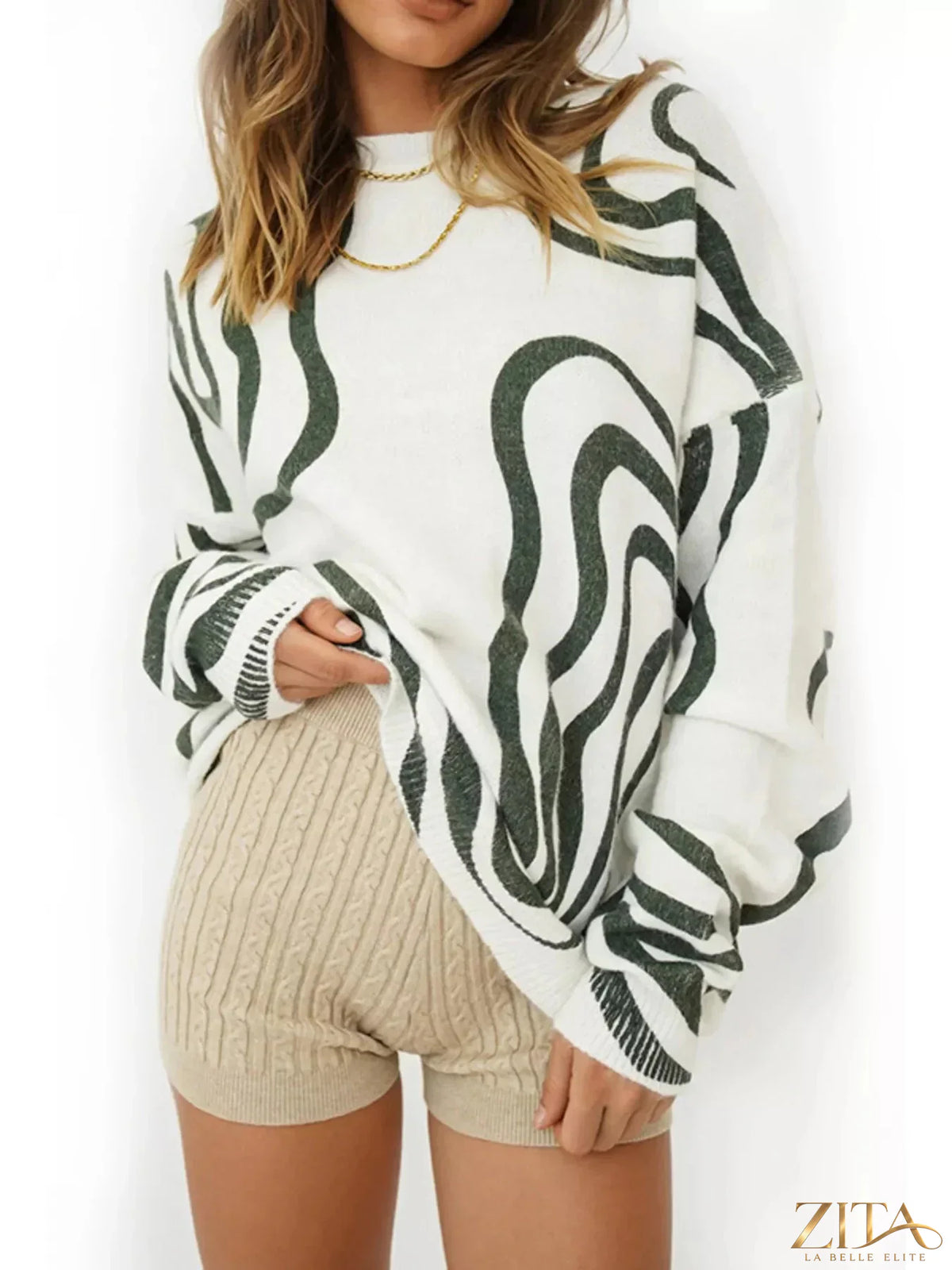 Wave pattern oversized sweater by Trendsi featuring a cozy, relaxed fit with a stylish wave design in soft knit fabric.