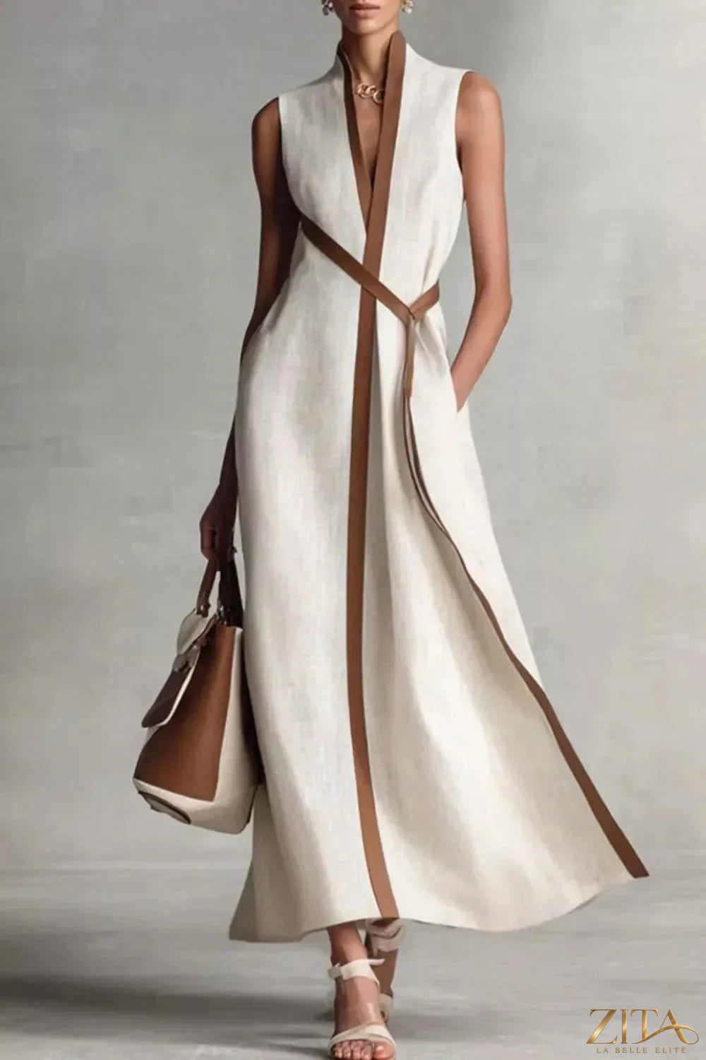 Sleeveless contrast trim midi dress by Trendsi, featuring a fitted silhouette and stylish design, shown on a model.