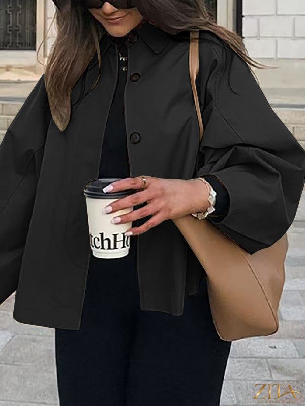Women's French-style loose mid-length trench coat by Zita La Belle Elite, featuring classic design and neutral color.