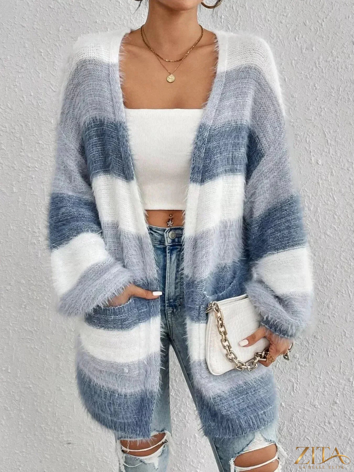 Zita La Belle Elite striped open front oversized cardigan with bold horizontal stripes and relaxed fit, displayed on a hanger.