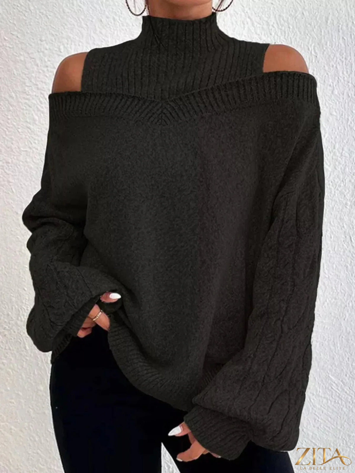 Zita La Belle Elite cold shoulder turtleneck sweater in soft knit fabric, featuring cut-out shoulders and fitted silhouette.
