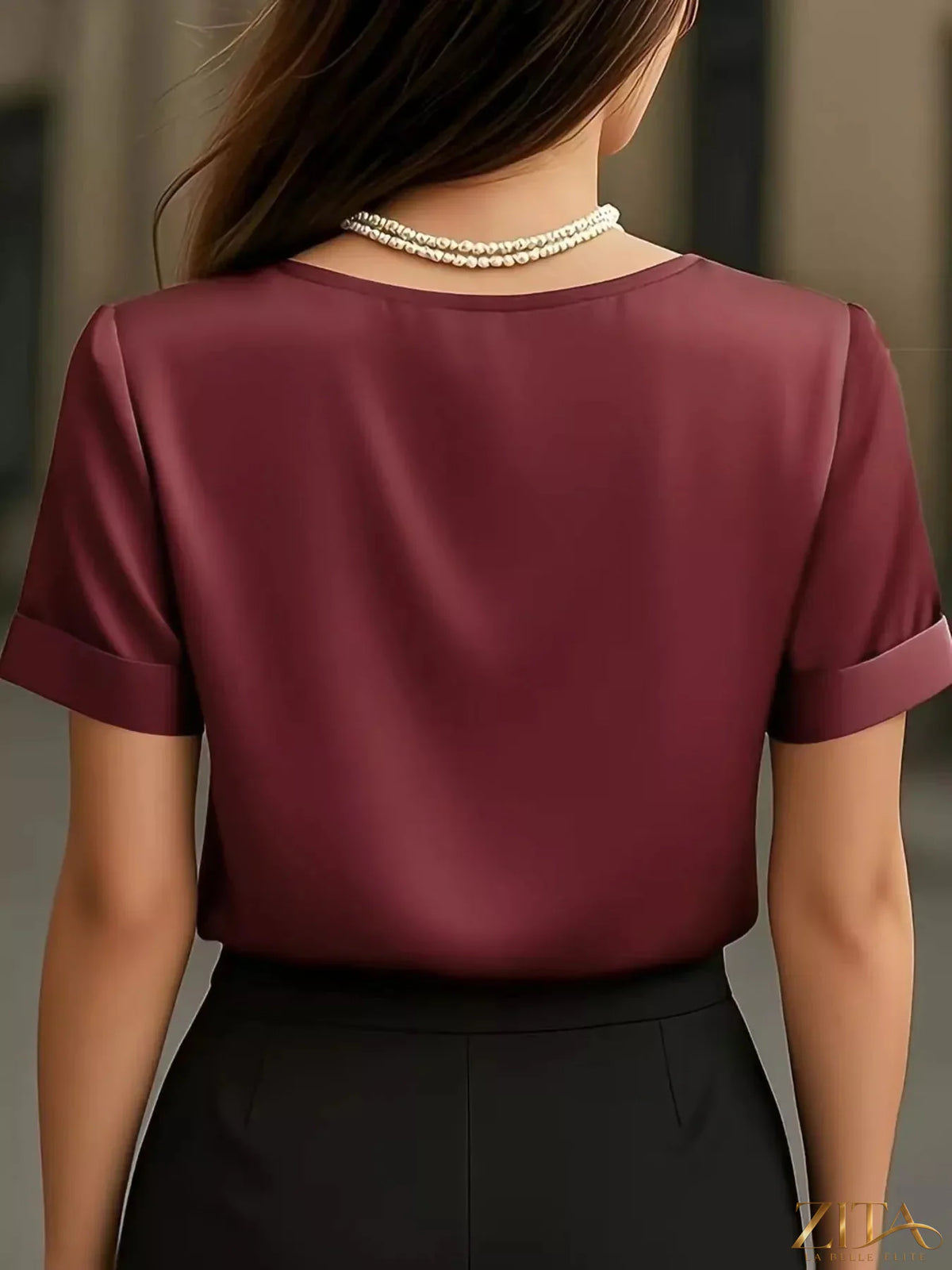 V-neck short sleeve satin blouse by Zita La Belle Elite, showcasing smooth fabric and elegant fit.