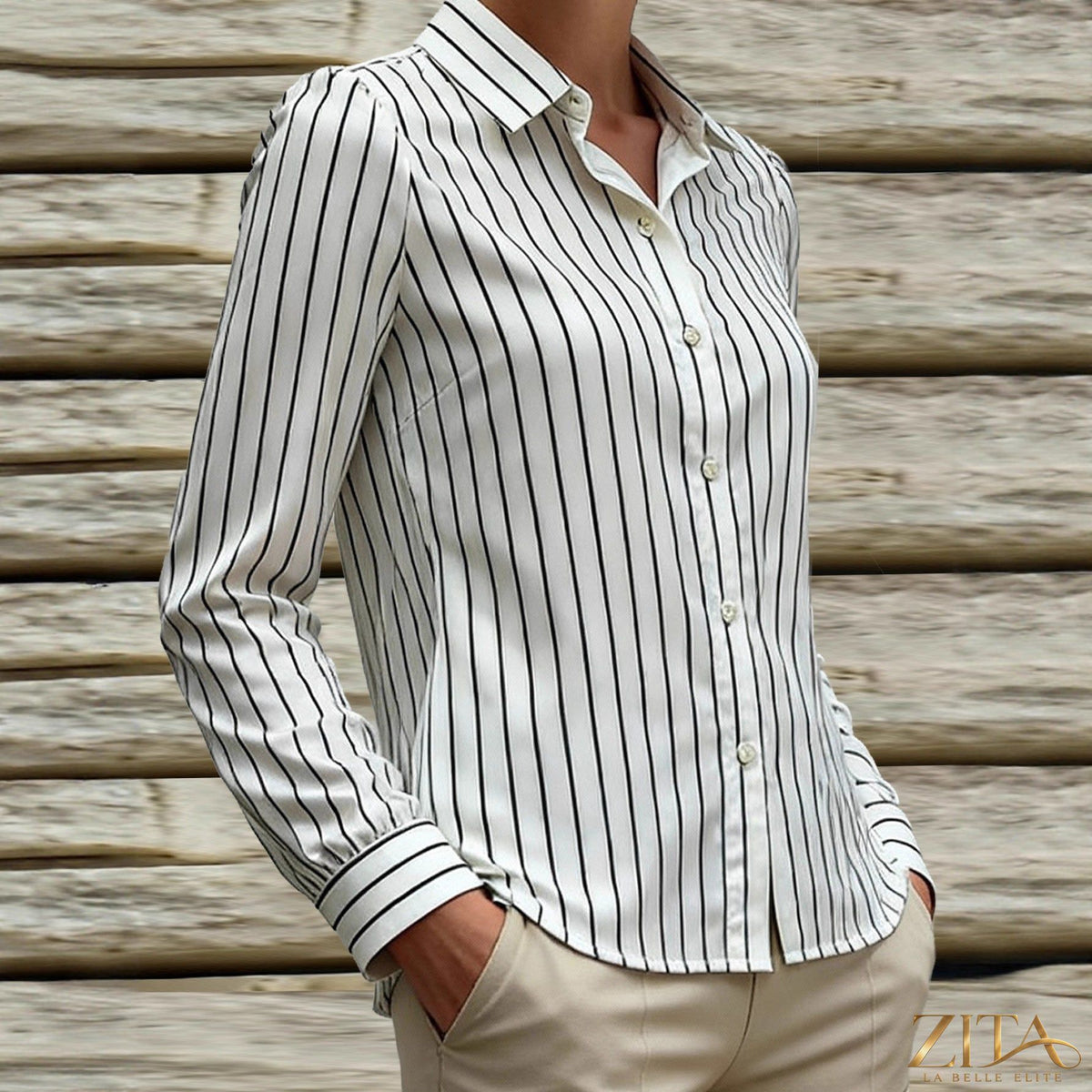 Black and white striped satin lapel shirt by Zita La Belle Elite, featuring a silky texture and classic collar detail.