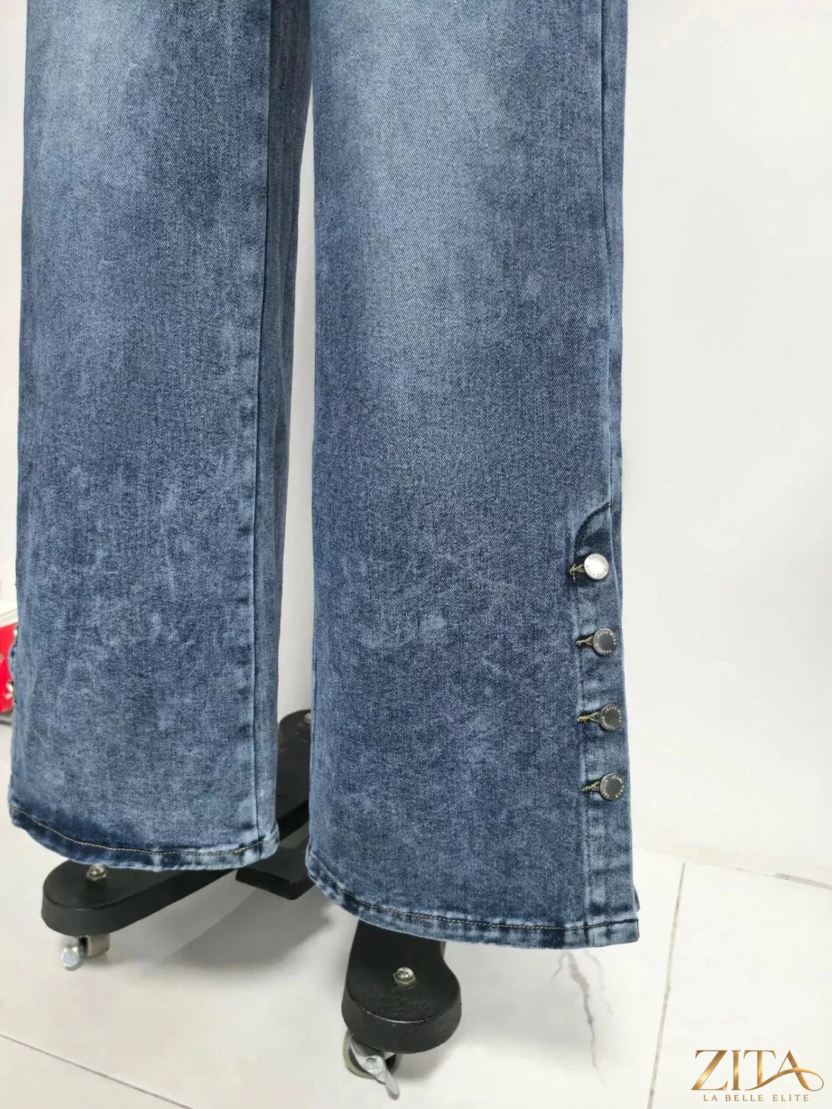 High waist wide leg jeans with button decor from Zita La Belle Elite, featuring a stylish and modern denim design.