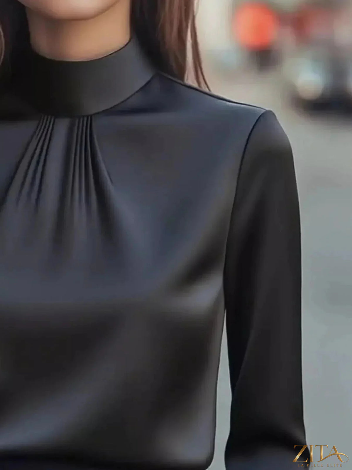 Zita La Belle Elite mock neck long sleeve blouse with pleated detail, featuring a fitted design and elegant style.