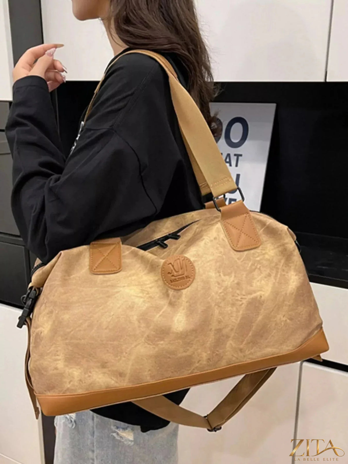 Vintage Oxford cloth duffel bag by Zita La Belle Elite, showing sturdy handle and spacious interior for travel or gym use.
