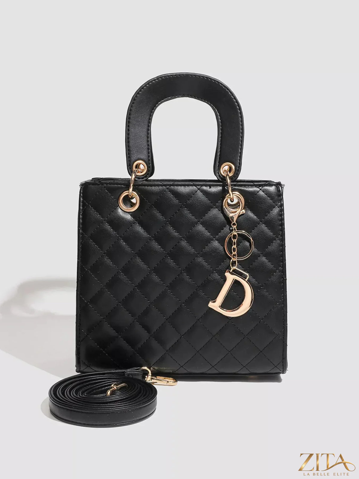 Zita La Belle Elite quilted top handle handbag with gold-tone hardware and elegant stitching on soft leather exterior.