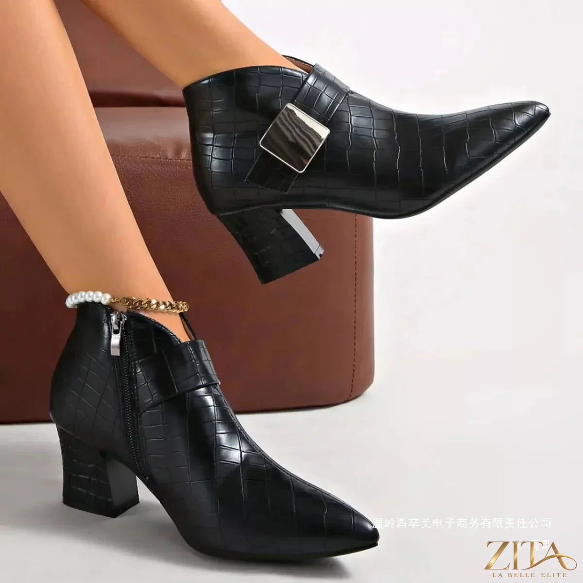Zita La Belle Elite point toe block heel boots showing sleek black leather with a sturdy block heel and elegant pointed toe design.