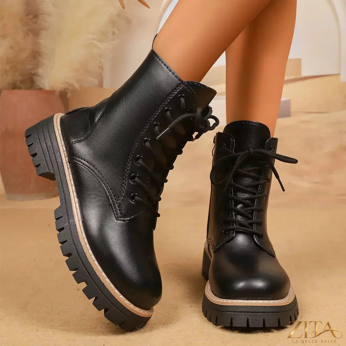 Lace-up platform boots by Trendsi featuring chunky soles, black leather, and stylish design for edgy fashion looks.