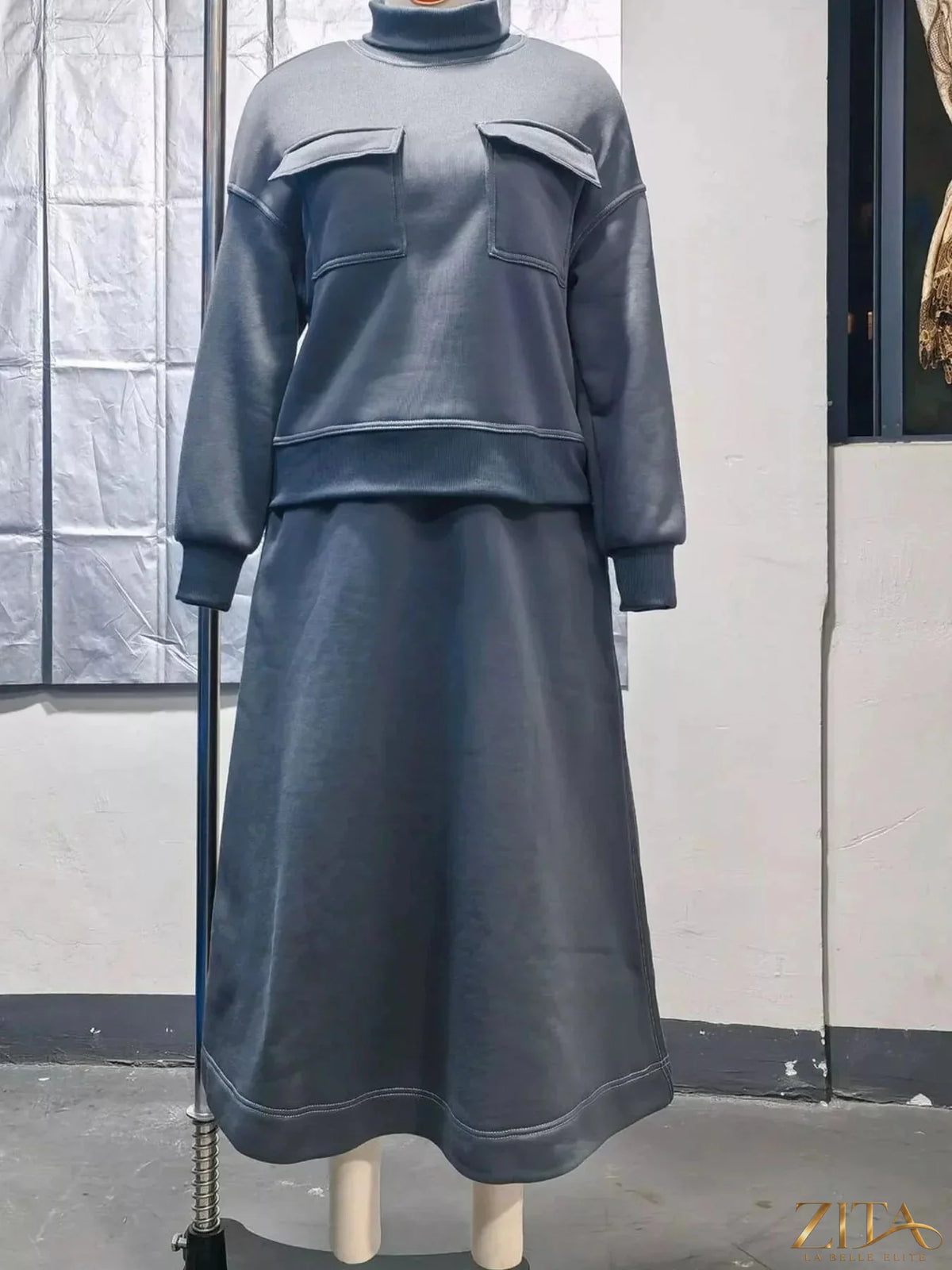 Zita La Belle Elite turtleneck knit top and midi skirt set, stylish cozy outfit for fall fashion, in neutral tones.