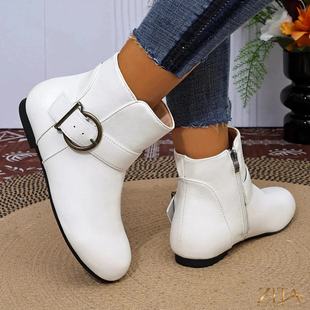 Trendsi round toe ankle boots with a sleek design, featuring smooth leather and a low stacked heel on a neutral background.