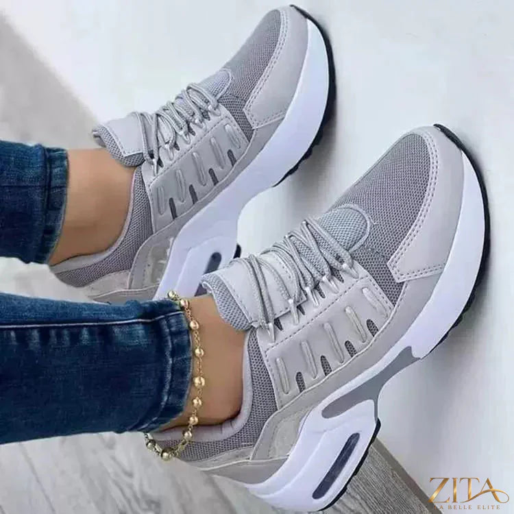 Zita La Belle Elite lace-up round toe sneakers with white and black design, casual footwear for women.