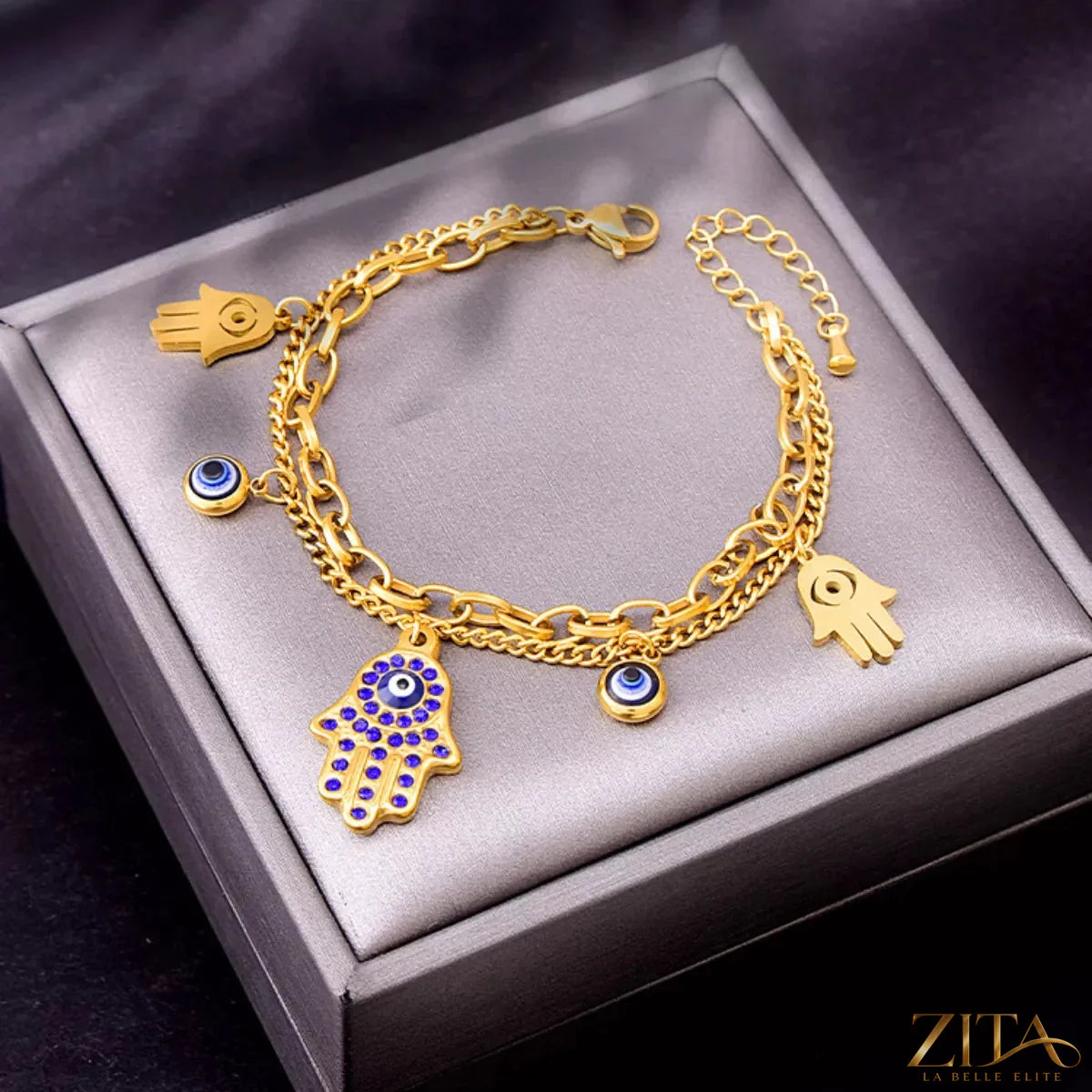 18K gold-plated hand charm jewelry set featuring delicate layered necklaces and matching earrings, styled on a display mannequin.