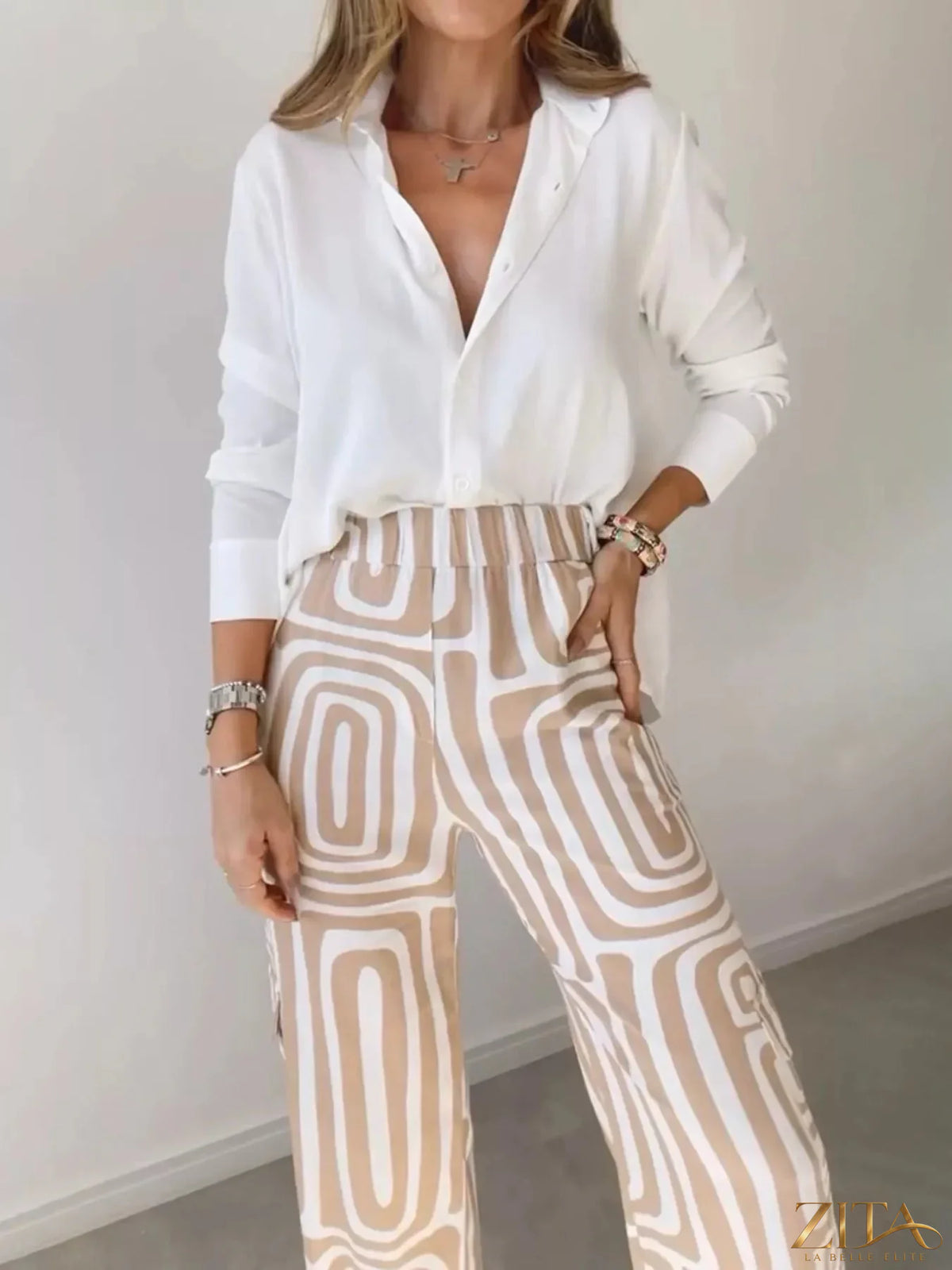 Plus size Zita La Belle Elite button-down shirt and geometric wide-leg pants set displayed on a model.