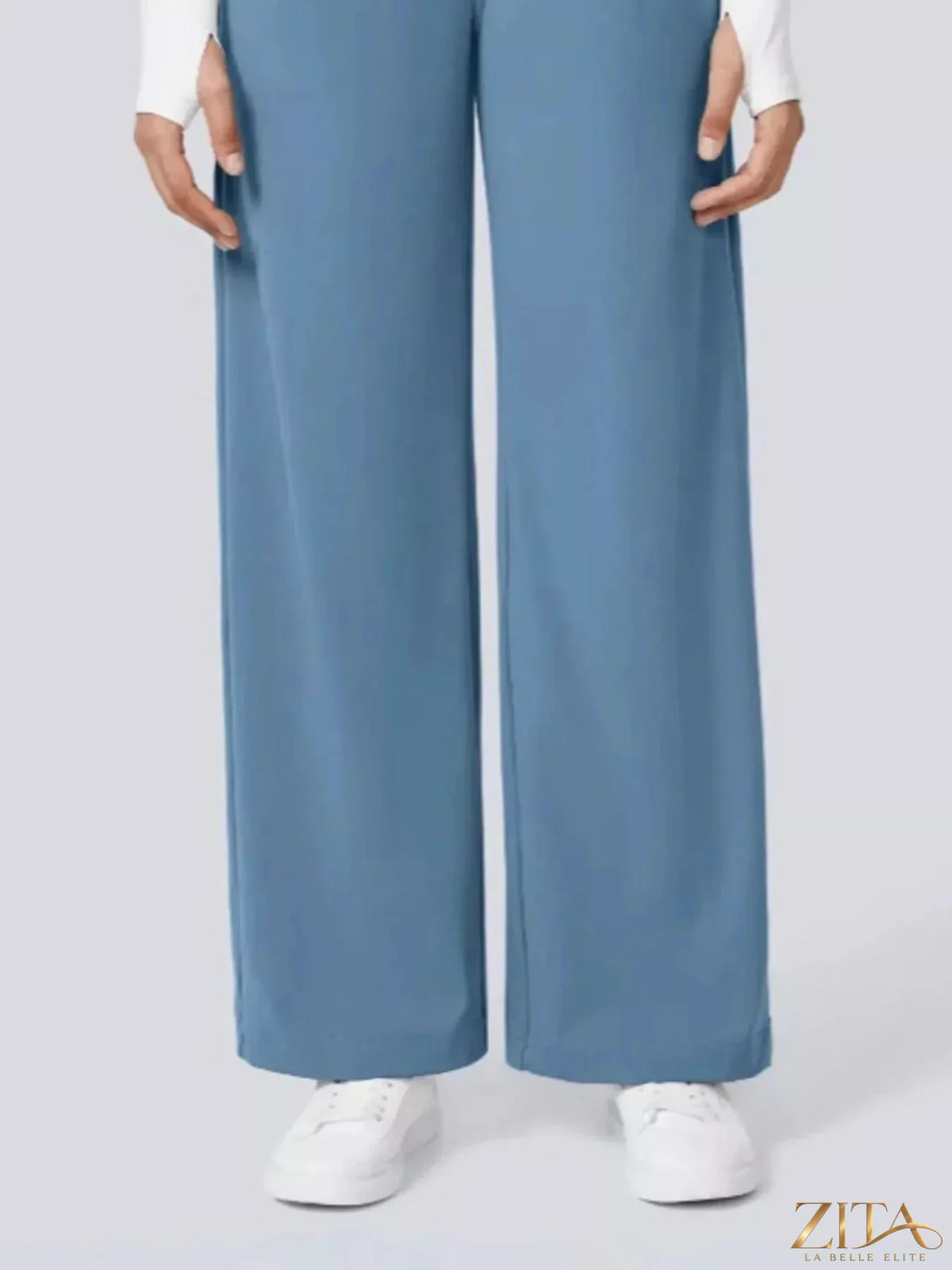 Zita La Belle Elite wide leg pants in soft fabric, featuring a high waist and relaxed fit, displayed on a hanger against a neutral background.