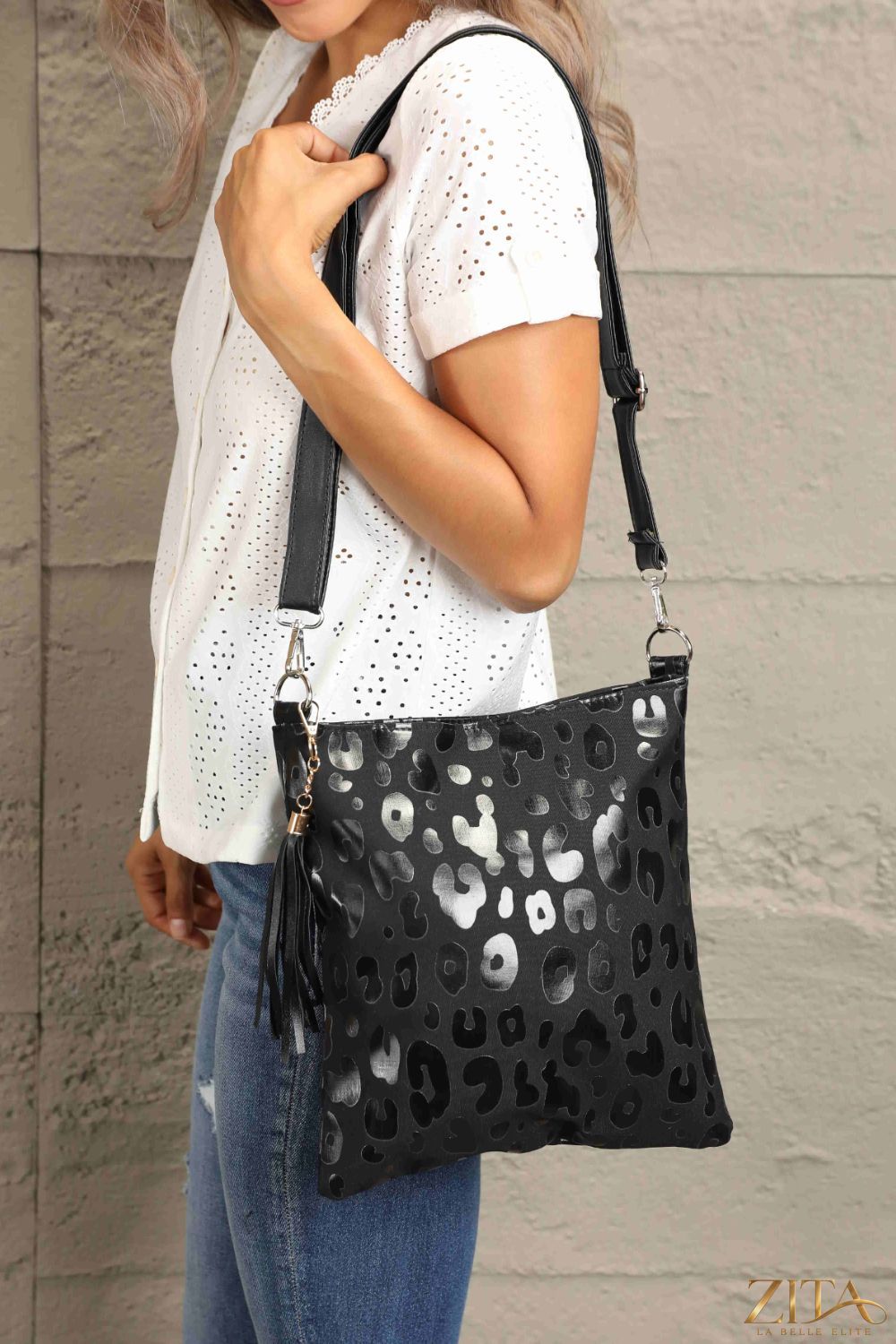 Zita La Belle Elite Adored PU leather shoulder bag with tassel, stylish accessory featuring a sleek design and adjustable strap.