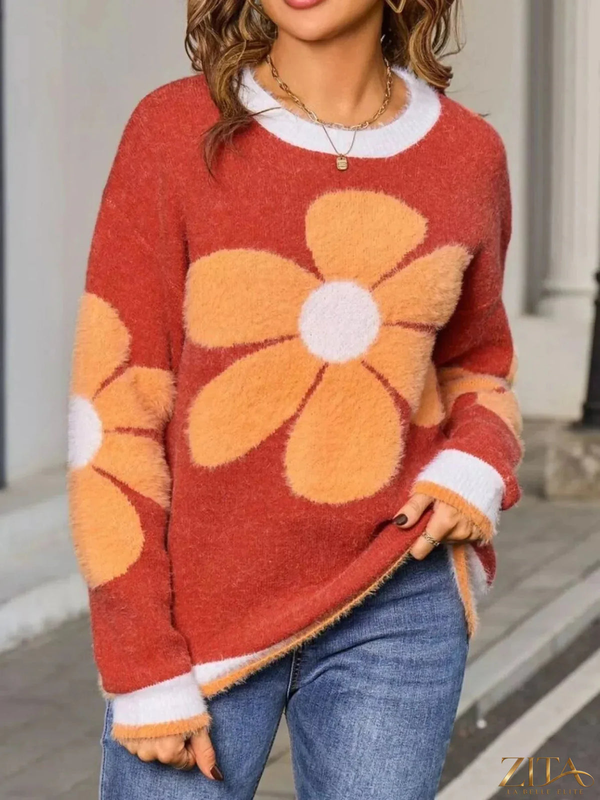 Zita La Belle Elite flower round neck sweater featuring a floral pattern and cozy knit fabric in soft colors.