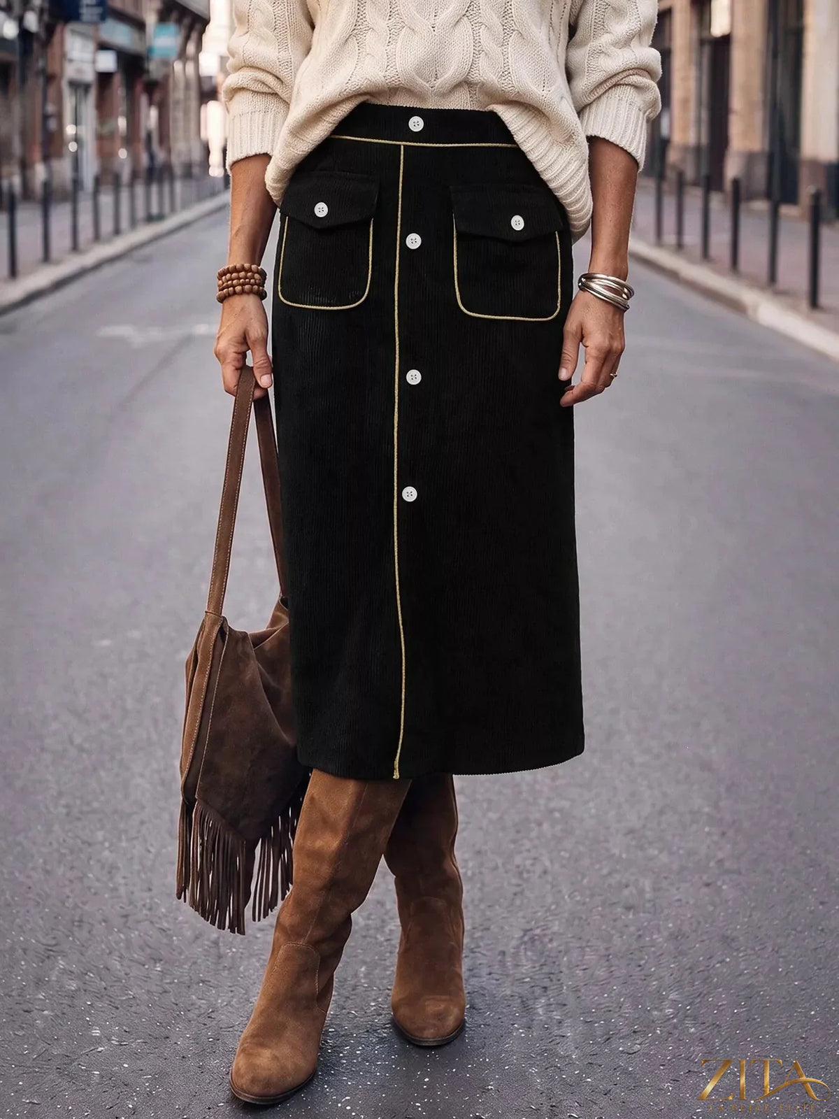 Zita La Belle Elite corduroy midi skirt in a stylish, textured fabric, displayed on a neutral background.