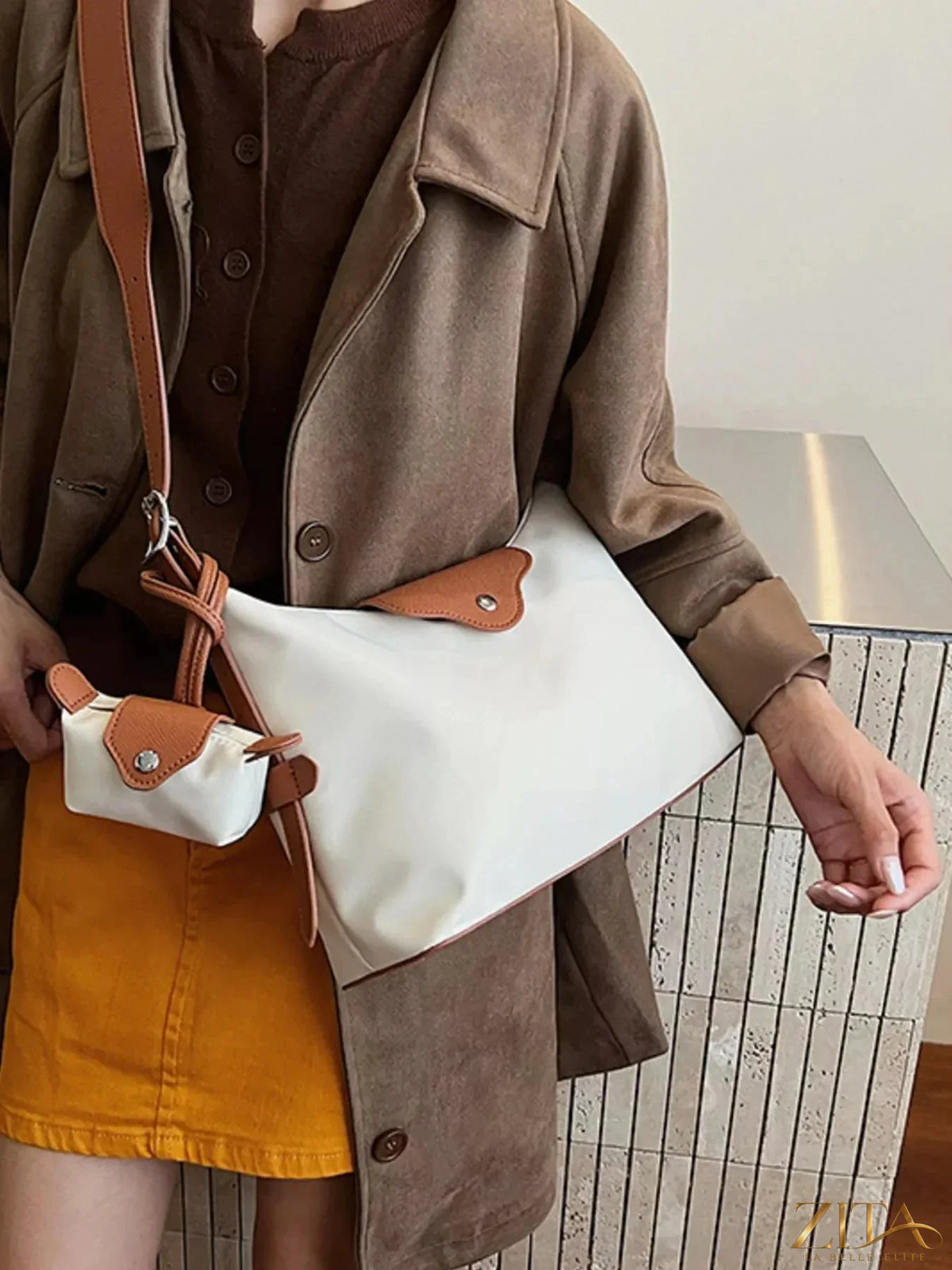 Zita La Belle Elite hobo crossbody bag with matching coin purse, black faux leather, adjustable strap, and stylish design.