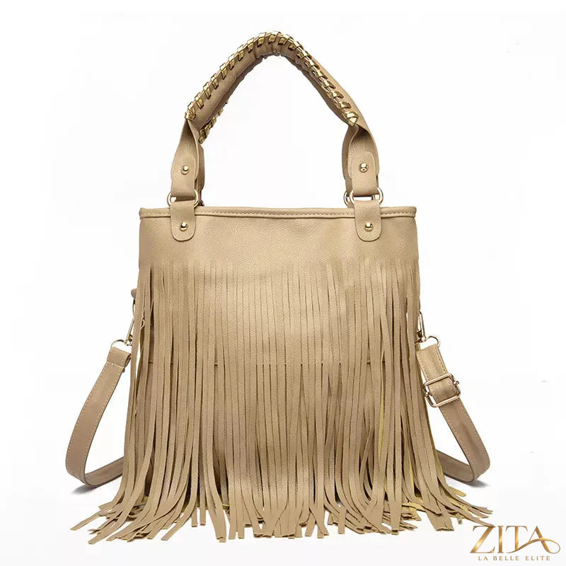 Zita La Belle Elite fringe PU leather handbag with tassel details and gold-tone hardware on a plain background.