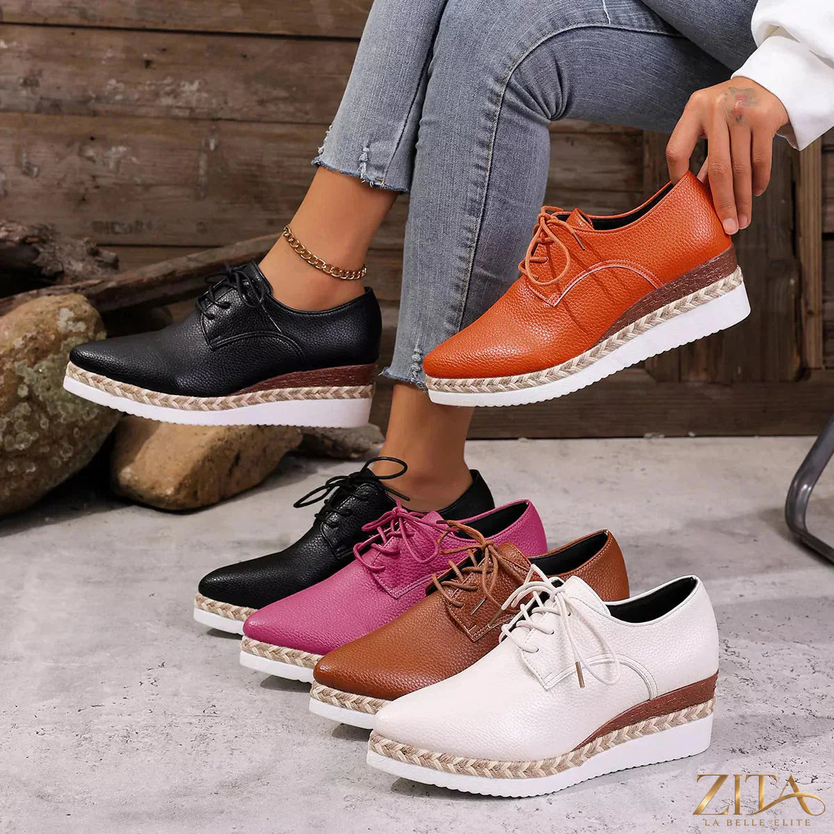 Zita La Belle Elite point toe lace-up sneakers with sleek design and white finish, showcasing stylish footwear with laced front and pointed toe.