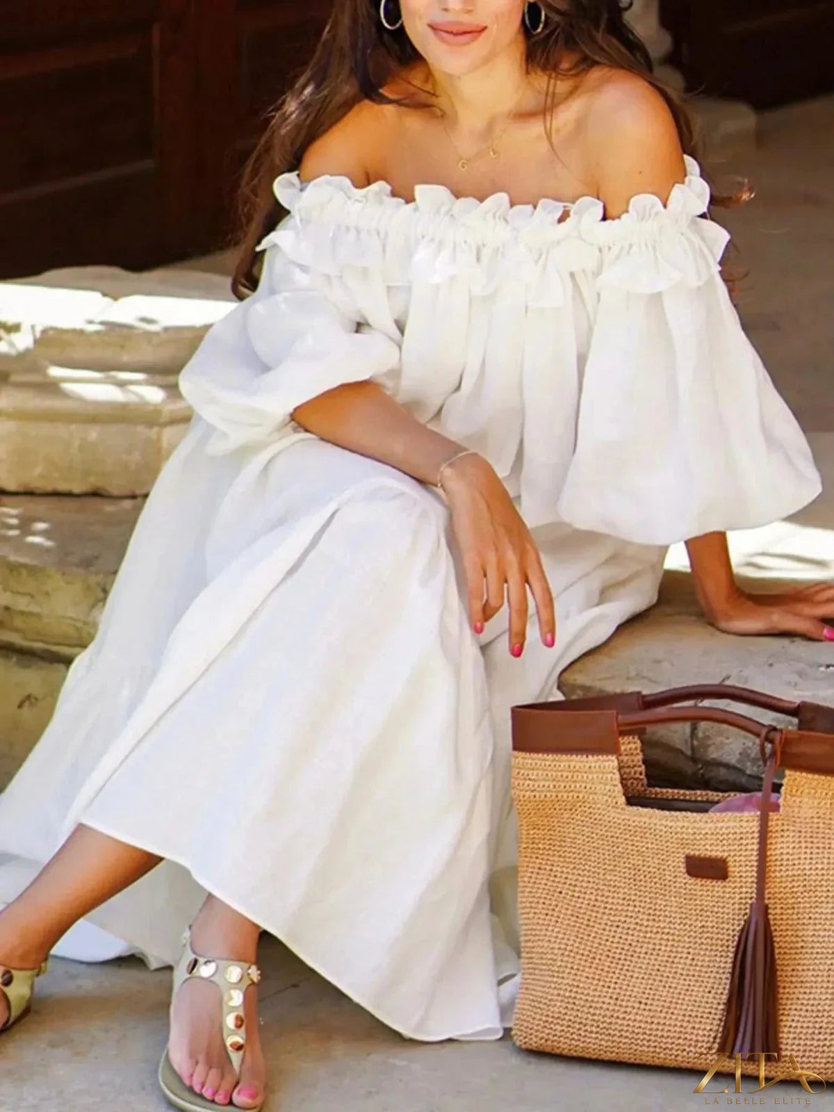 Zita La Belle Elite side slit off-shoulder dress in flowing fabric, showcasing a stylish off-shoulder neckline and elegant slit detail.