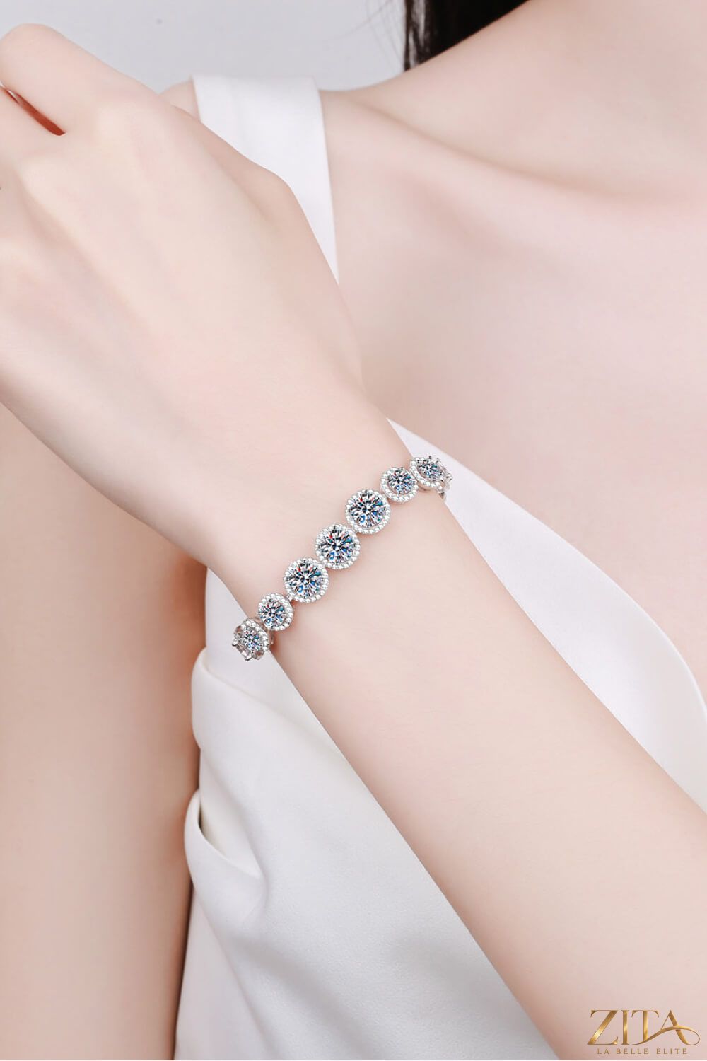 Sterling silver bracelet with sparkling 10.4 carat moissanite stones, featuring a sleek and elegant design.