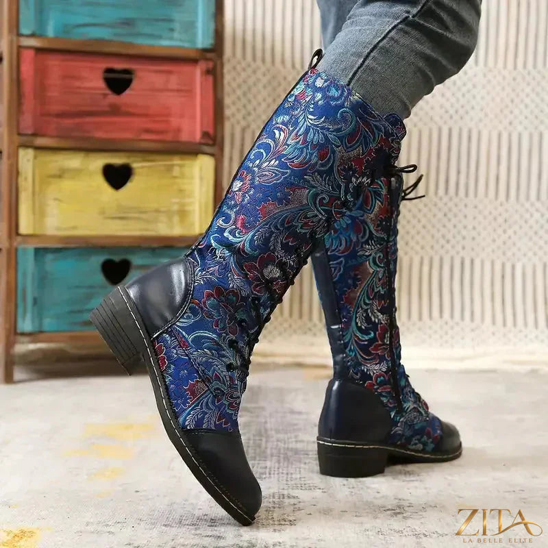 Zita La Belle Elite embroidered lace-up knee-high boots with intricate detailing and a stylish silhouette.