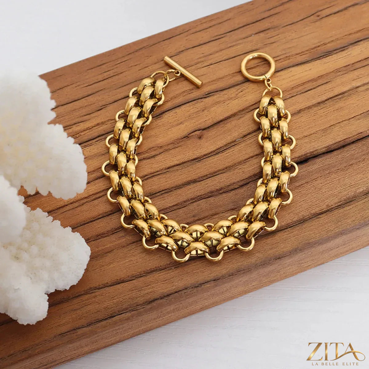 Gold chain link jewelry set featuring a matching necklace and bracelet with a trendy, stylish design.