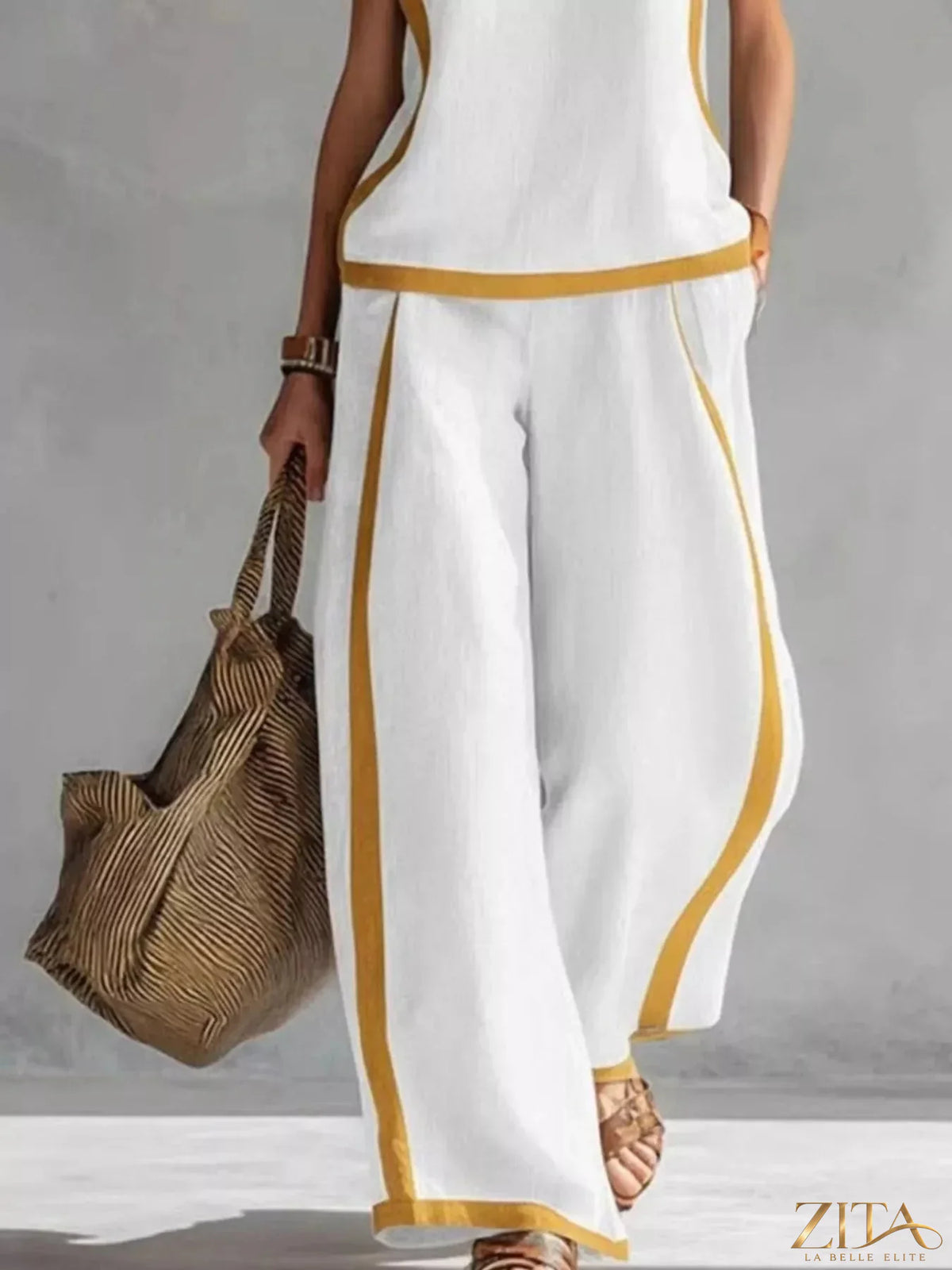 Zita La Belle Elite sleeveless tank top and wide-leg pants set, in a stylish, casual outfit with a relaxed fit and neutral tones.