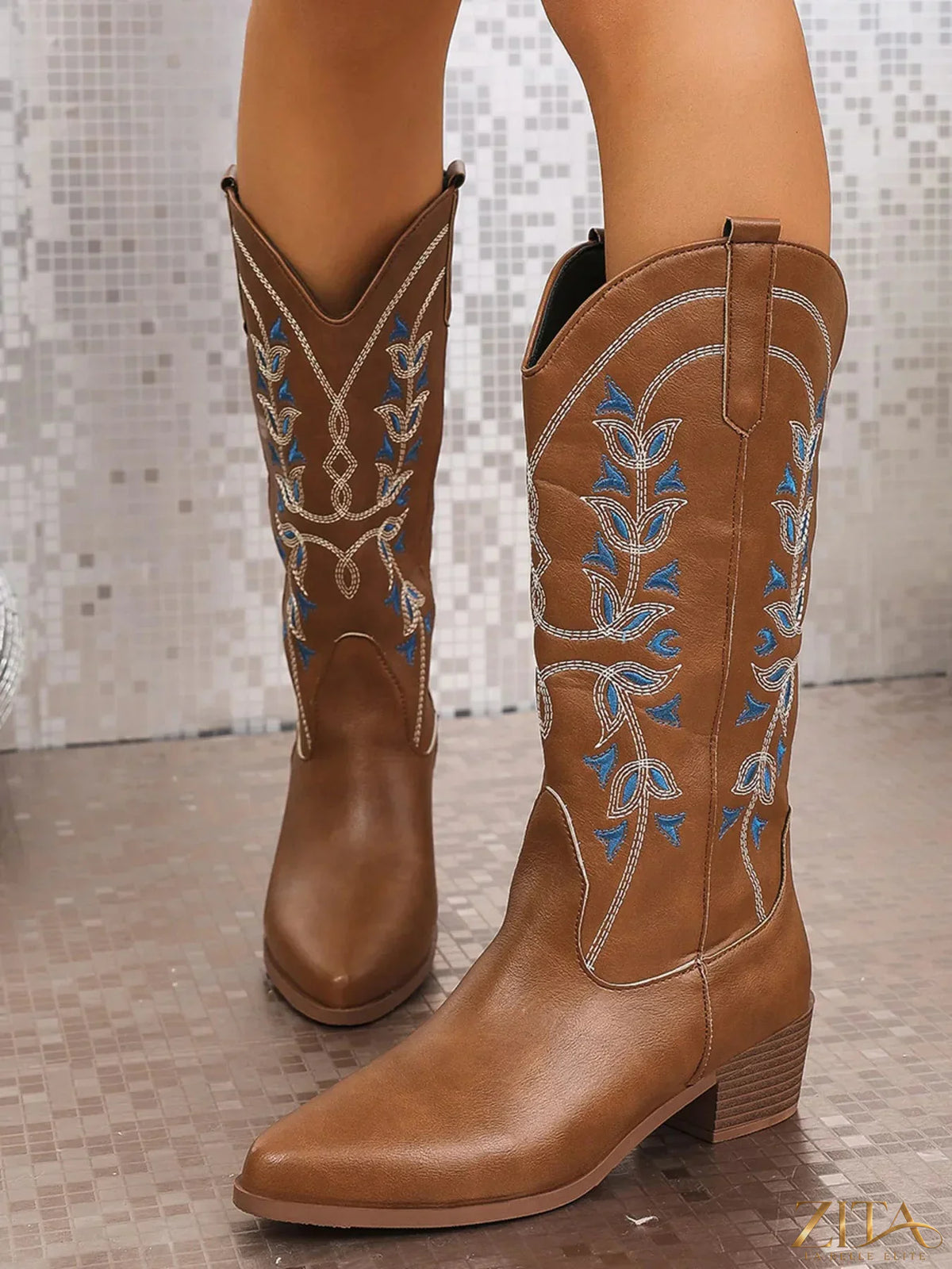 Zita La Belle Elite point toe block heel boots showing sleek black leather upper and stylish silhouette.