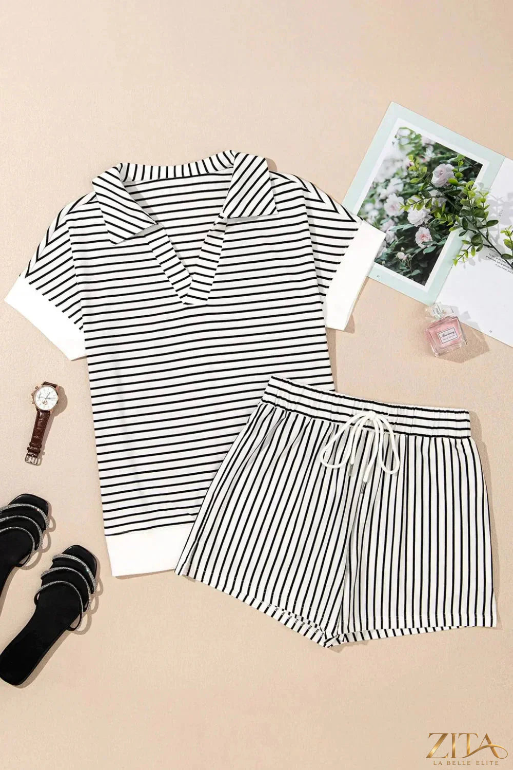 Stripe V-neck T-shirt and casual shorts set by Trendsi, featuring a relaxed fit and comfortable fabric in a stylish two-piece design.