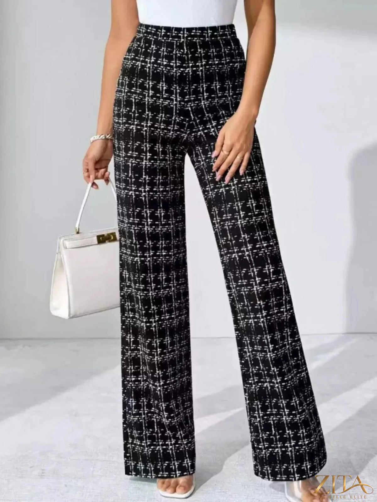 Zita La Belle Elite plaid wide leg pants shown, featuring a stylish plaid pattern and relaxed fit for casual or chic outfits.