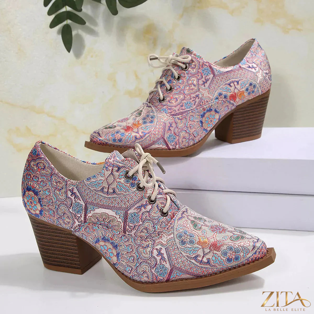 Zita La Belle Elite point toe block heel ankle boots with sleek design and stylish silhouette, shown in black leather.
