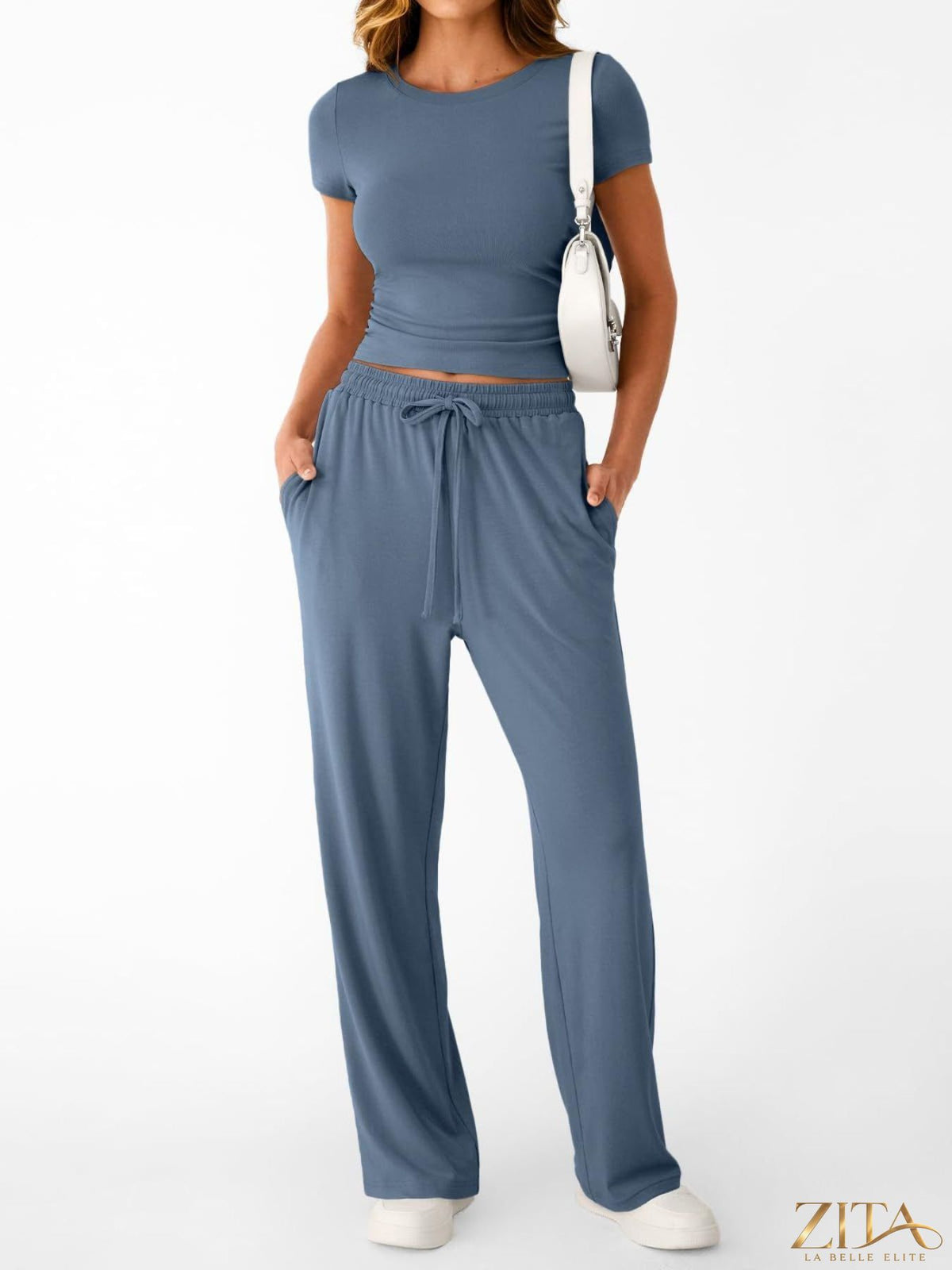 Trendsi round neck short sleeve tee and matching pants set in soft fabric, casual and comfortable for everyday wear.