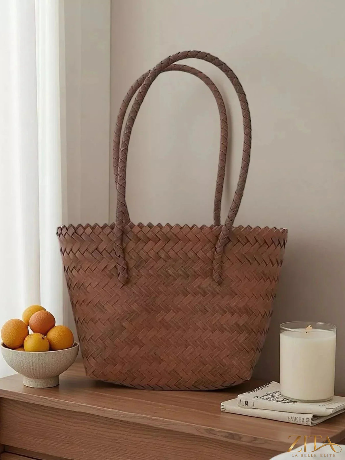 Zita La Belle Elite braided tote bag with sturdy handles, made from natural woven material, perfect for casual carrying.
