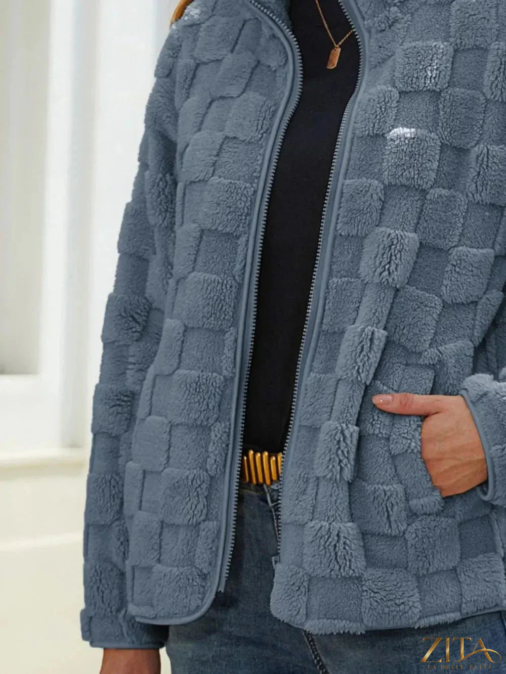 Zita La Belle Elite fuzzy checkered zip-up jacket with a cozy, stylish design and front zipper detail.